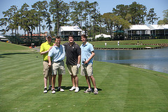 Four men on a golf course