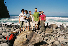 Family on the rocky shores of Hawaii