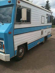 Blue and white motor home