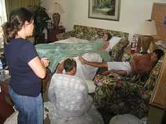 Family members gather in the bedroom 